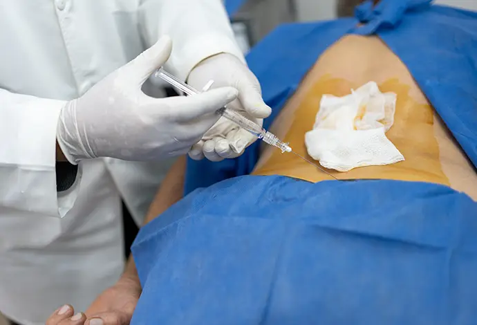 Patient receiving treatment for Sciatica from doctor at the Saint Louis Pain Center